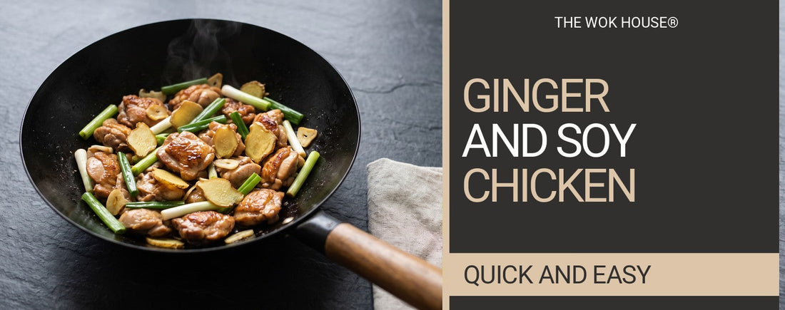 Chicken thigh pieces stir-fried with sliced ginger and spring onion in a black wok