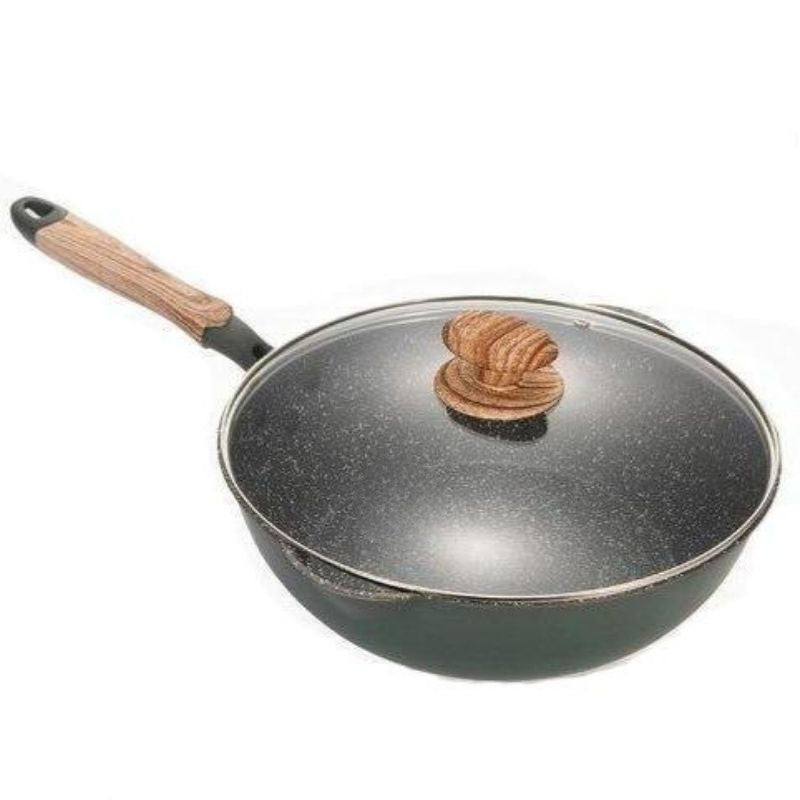 Aso granite wok with glass lid and wooden handle on induction cooktop