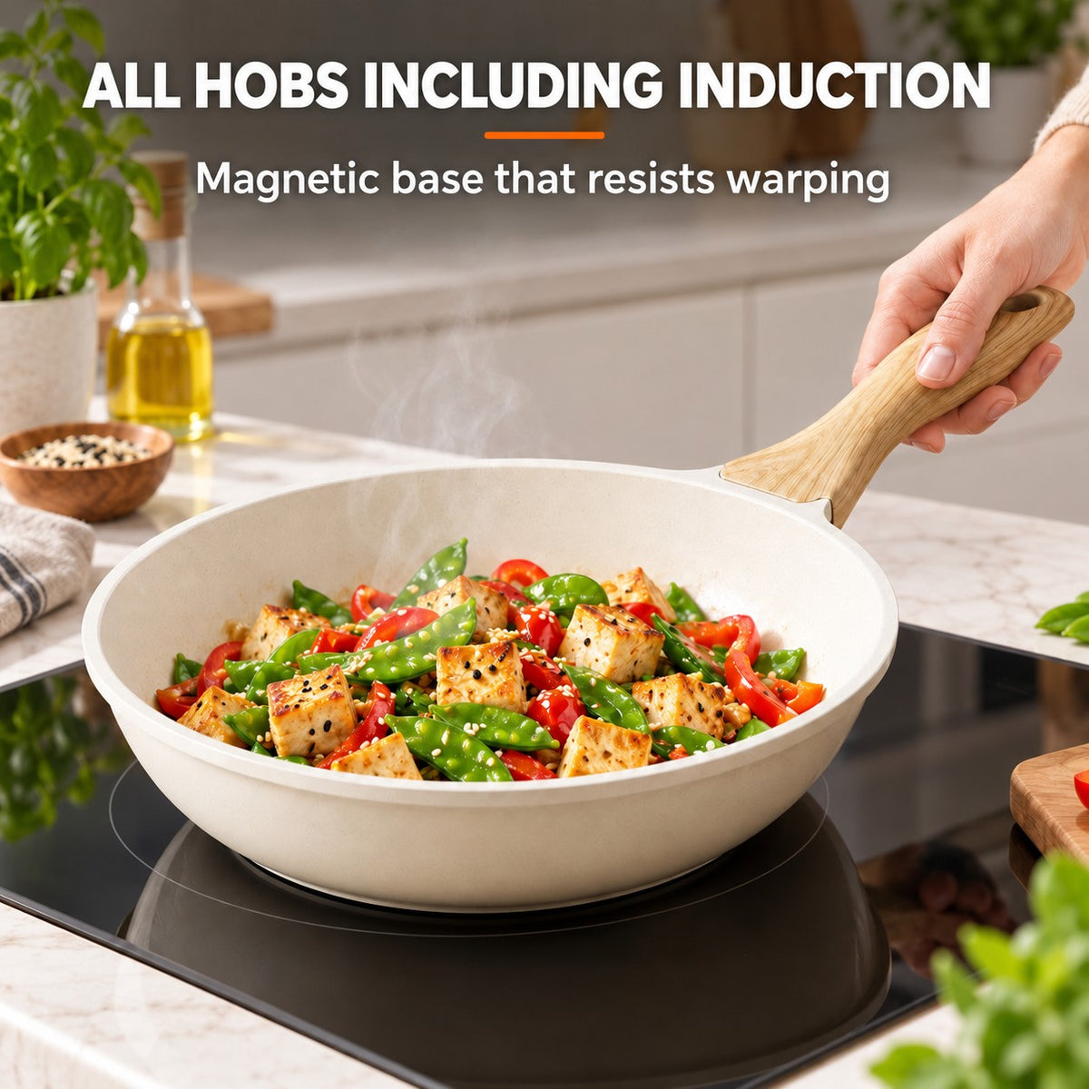 Durable ceramic wok, ALL HOBS INCLUDING INDUCTION: Magnetic base that resists warping