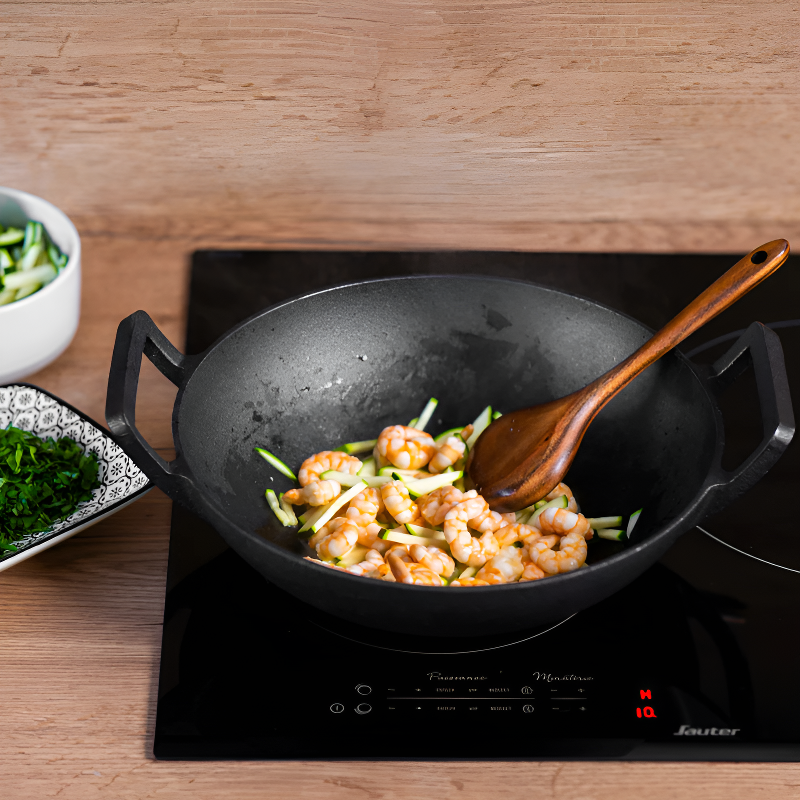 Tekari handleless cast iron wok with wooden lid for induction cooking