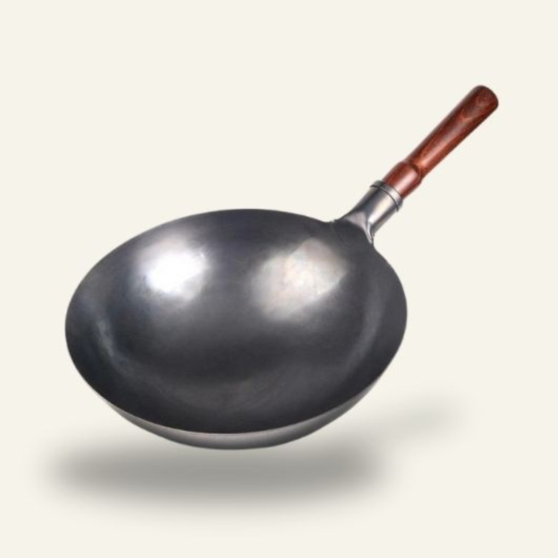 A hand-forged wok that holds its heat Image