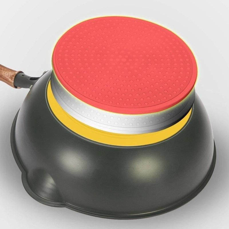 Aso granite wok with glass lid and wooden handle on induction cooktop