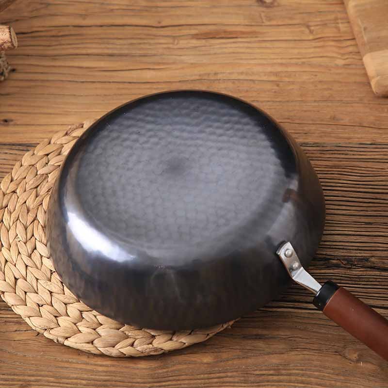 The Pekaji flat-bottom carbon steel wok