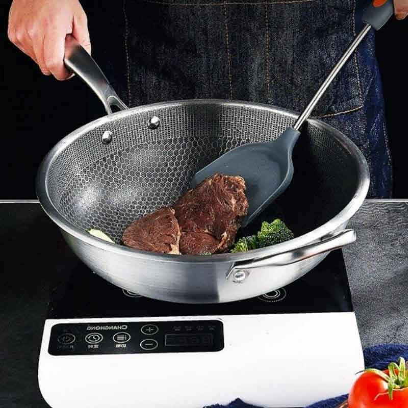 Kita stainless steel induction wok with non-stick honeycomb coating and ergonomic handle